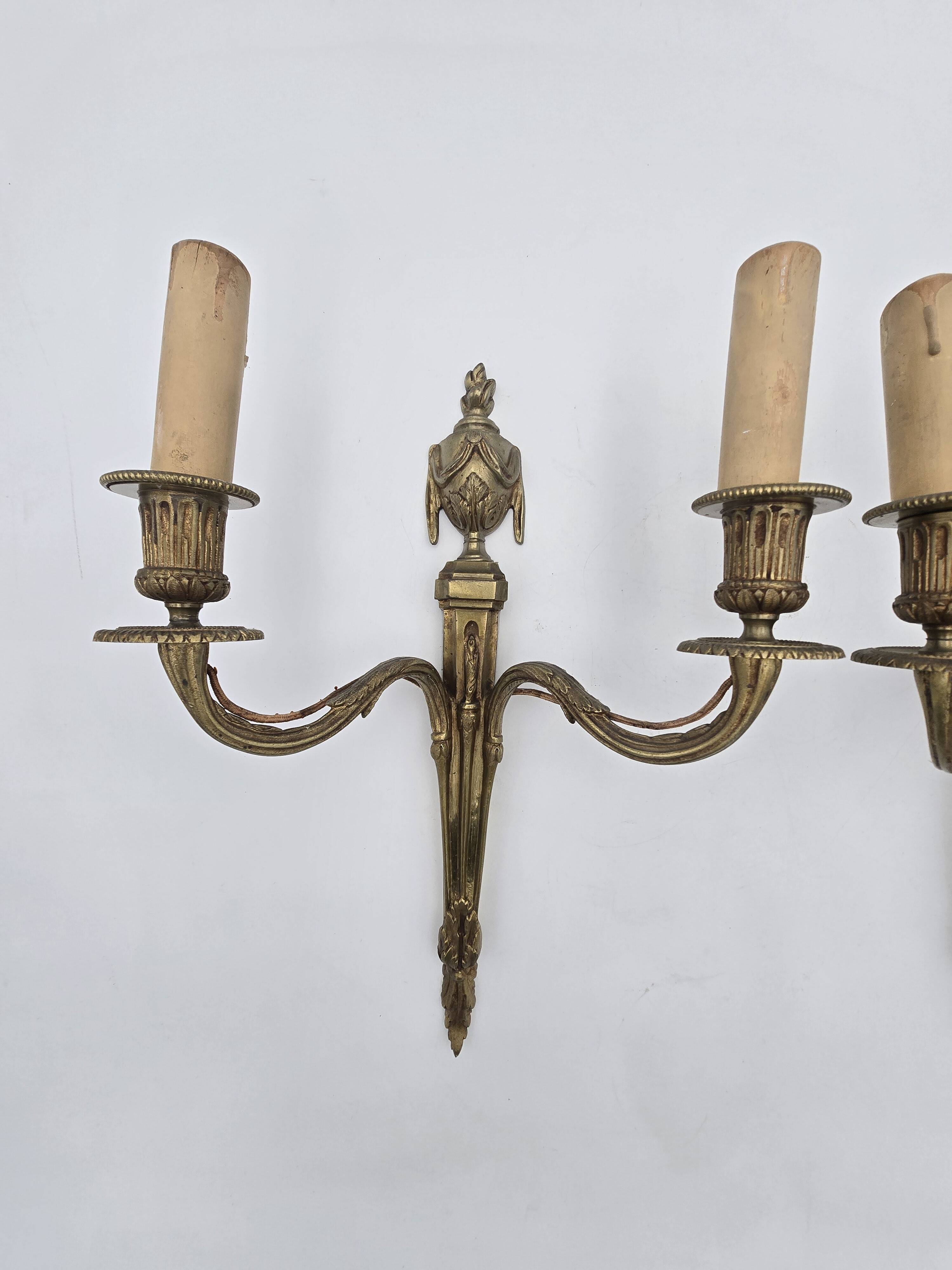 Pair of antique Louis XVI style bronze wall lights