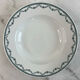 Set of 5 mismatched deep plates in earthenware and stoneware.