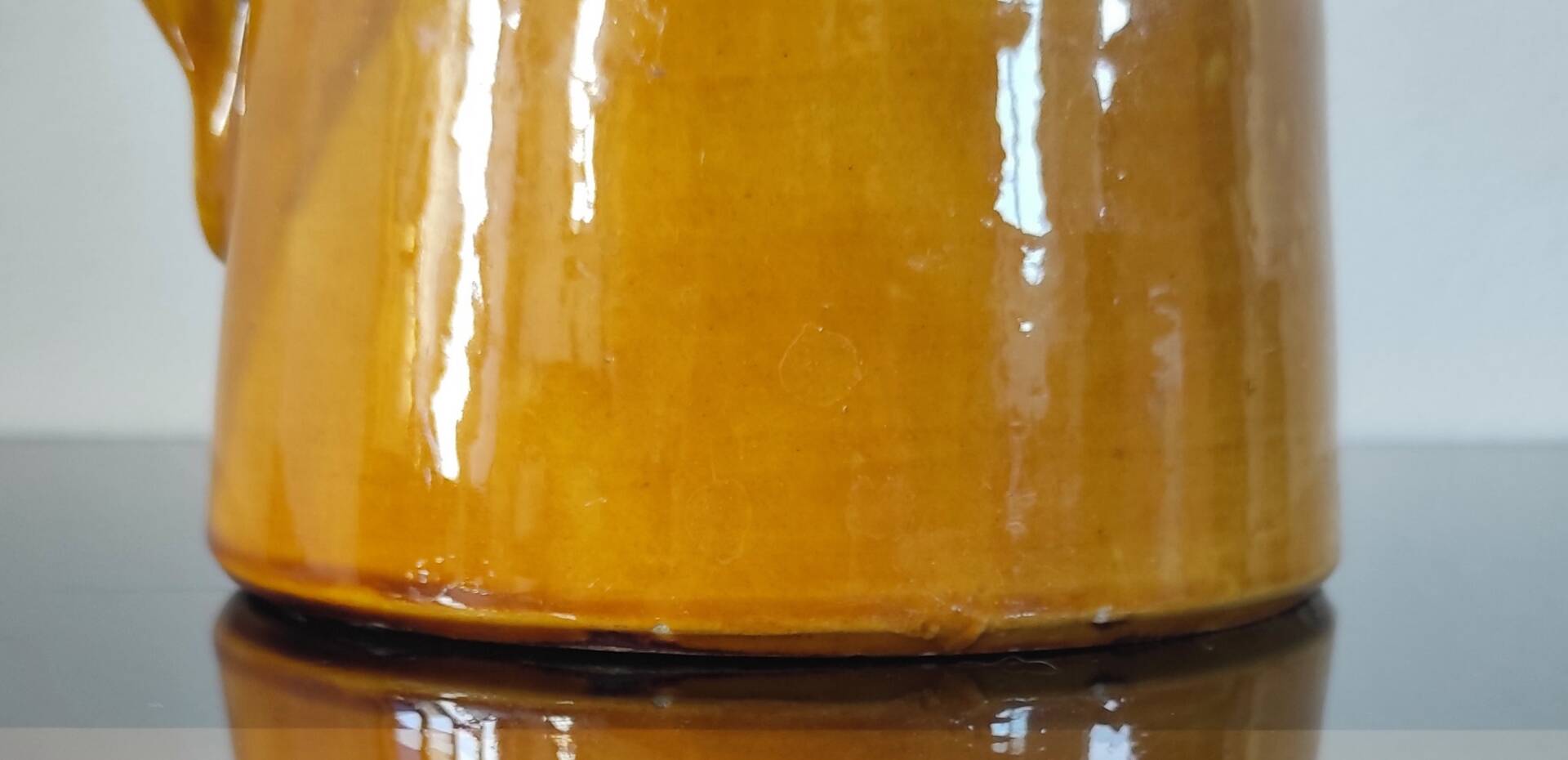 Vintage glazed terracotta pitcher