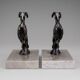 Art Deco bookends with patinated ibex in a taupe marble base.