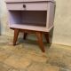 Vintage pale pink bedside table