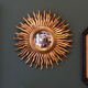 Vintage sun mirror with witch's eye mirror