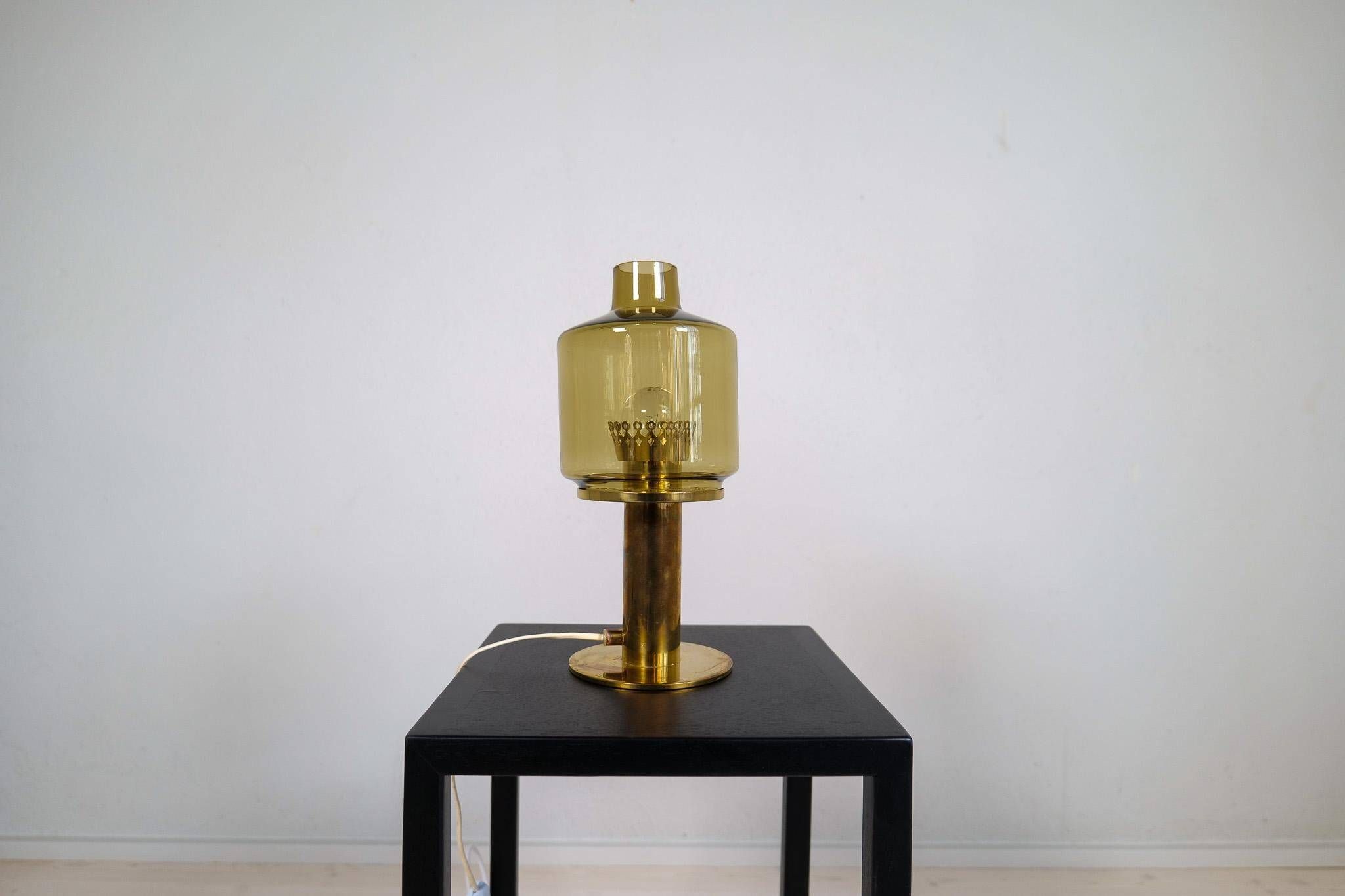 Hans-Agne Jakobsson Table Lamp Model B-102 in brass and glass, 1960s, Sweden