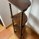 Corner shelf on a turned wooden stand