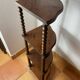 Corner shelf on a turned wooden stand