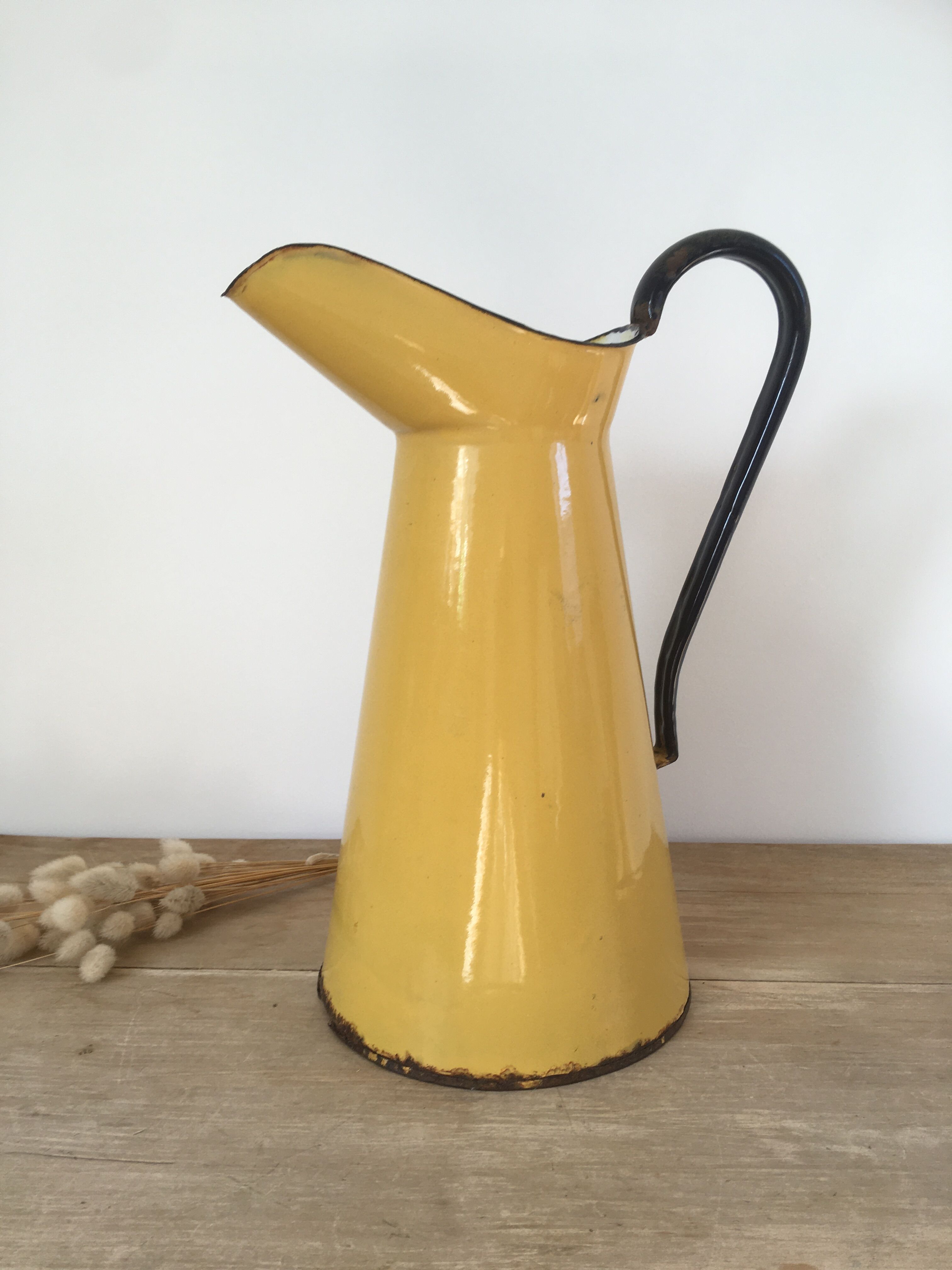Mustard yellow enamelled sheet metal pitcher