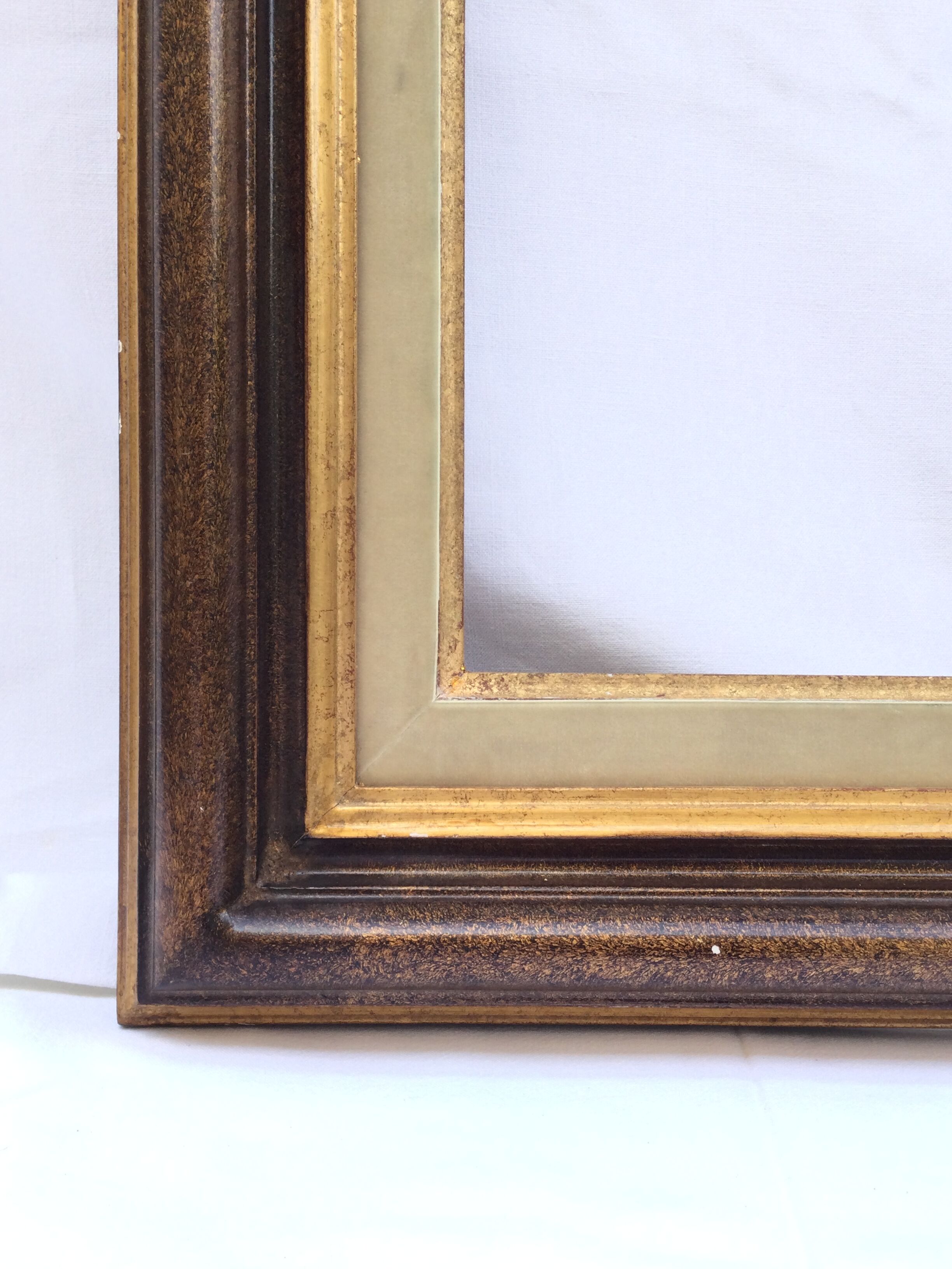 Gilded wooden frame and fabric
