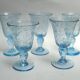 5 glasses with blue Biot stemmed
