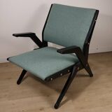 Vintage armchair from the 1960s in black wood and fabric.