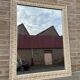 Mirror antique style in travertine from italy