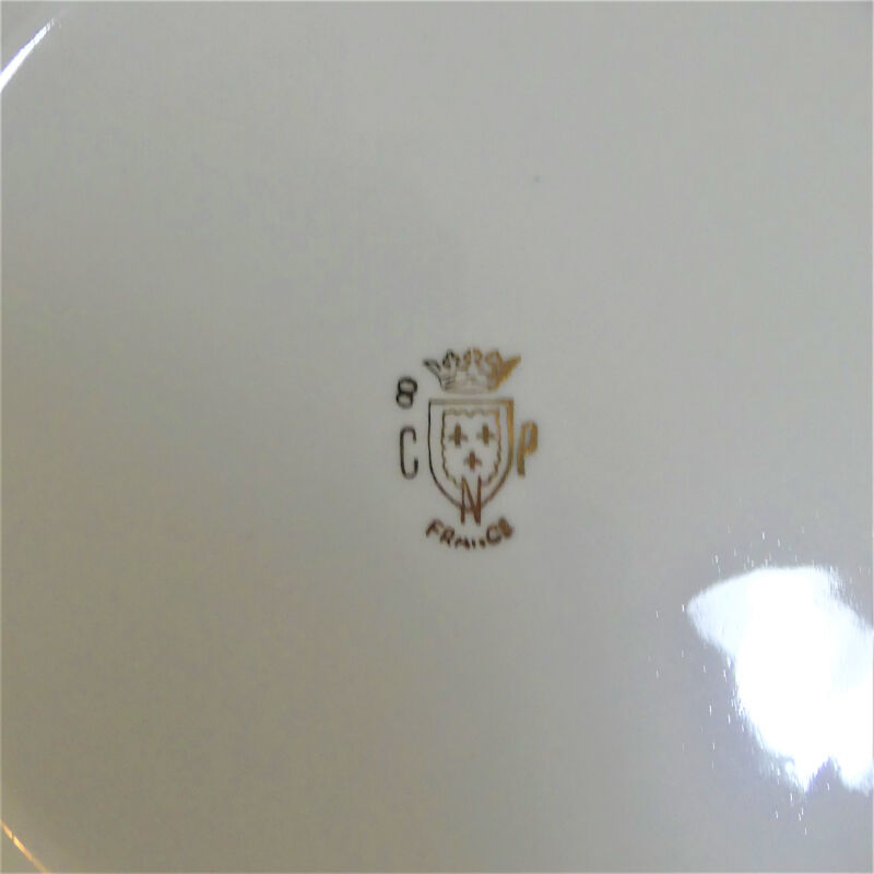 Antique porcelain table plates stamped C.N.P