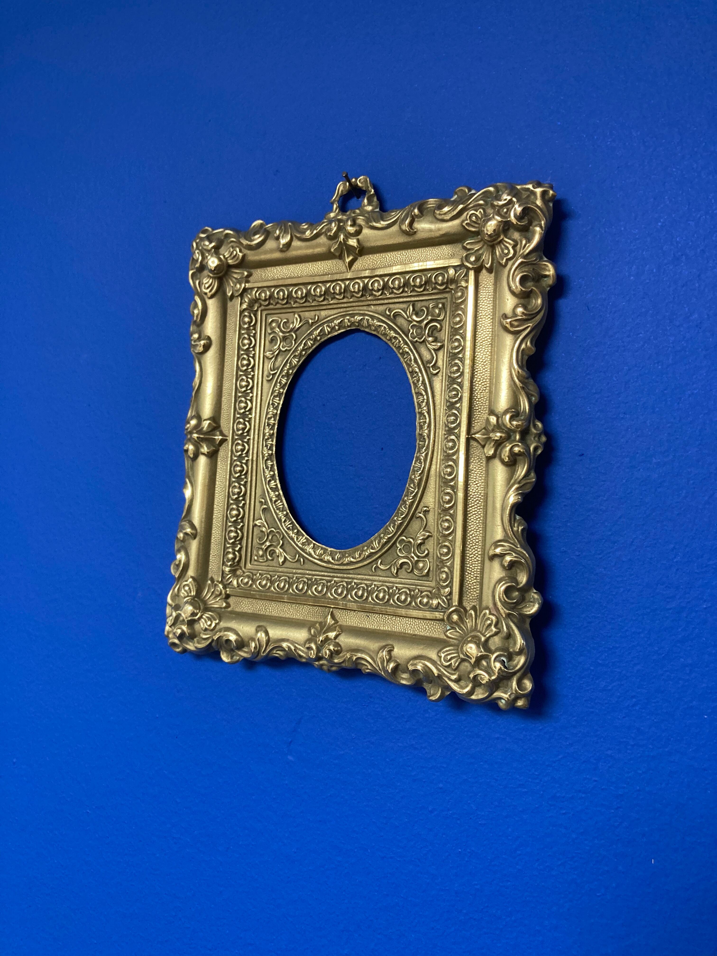 Pair of brass photo frames