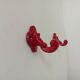 Pair of vintage wall hooks in enamelled cast iron.