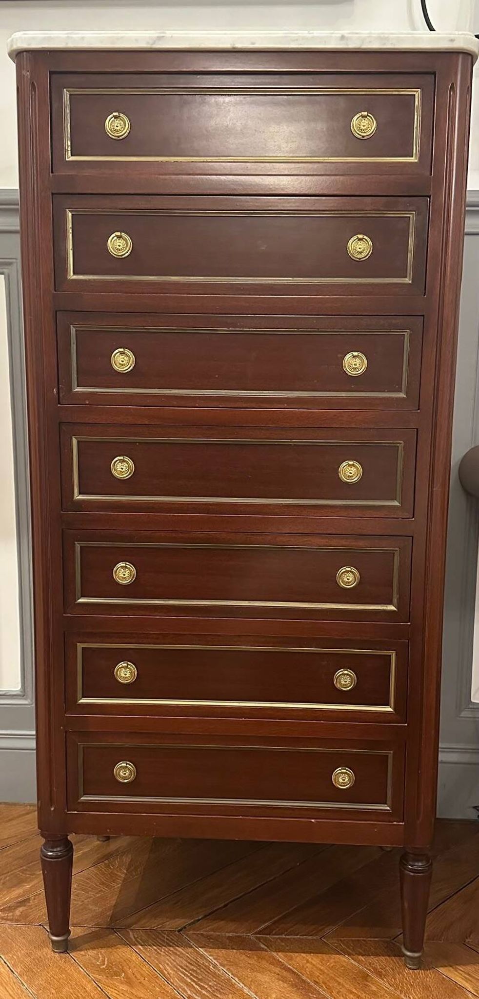 Louis XVI style chest of drawers in mahogany and bronze