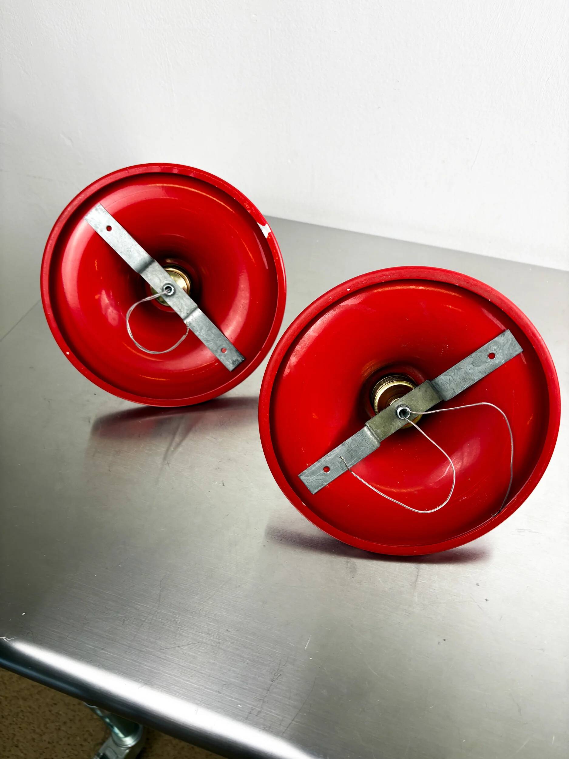 Pair of red Targetti Sankey sconces, 1970s, Italy