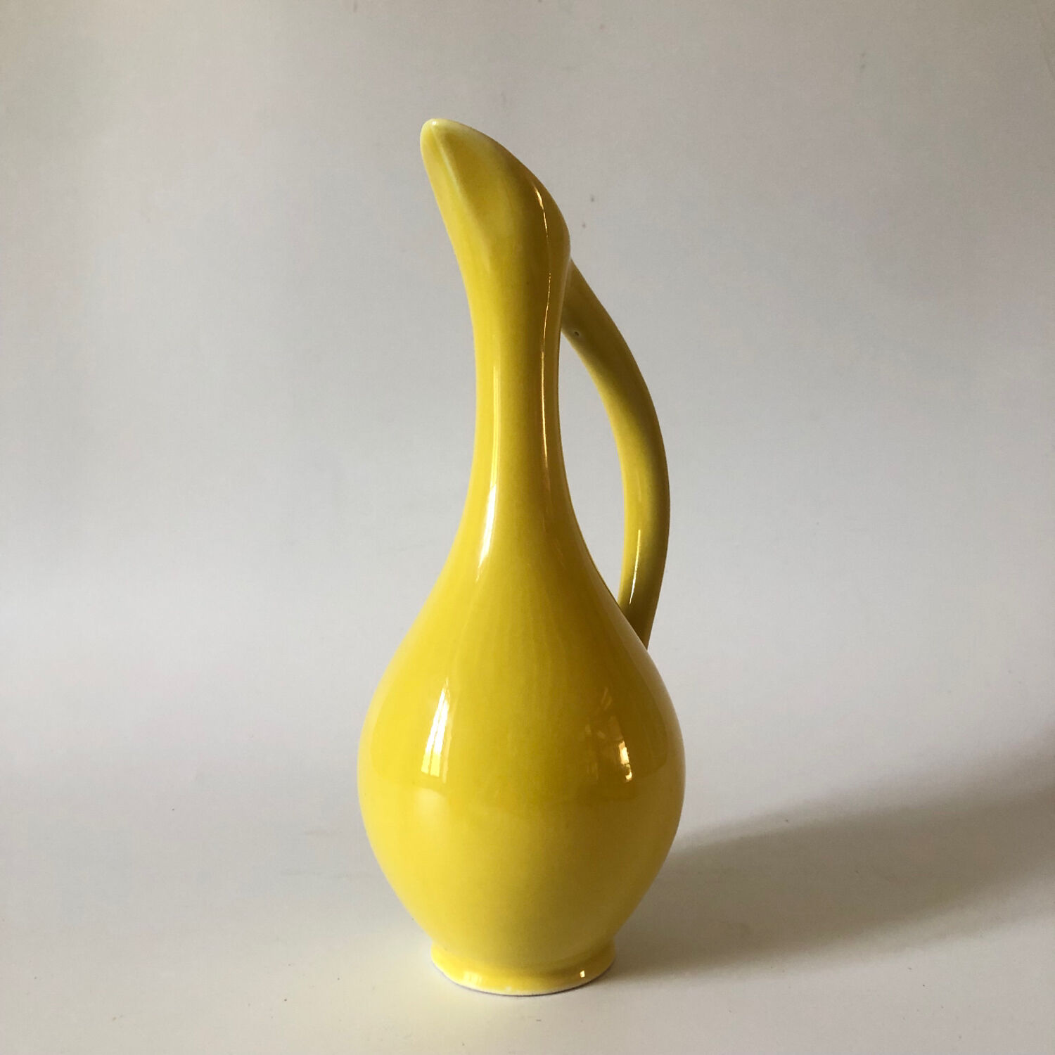 Vintage yellow ceramic decanter