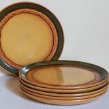 Six vintage stoneware plates with green net