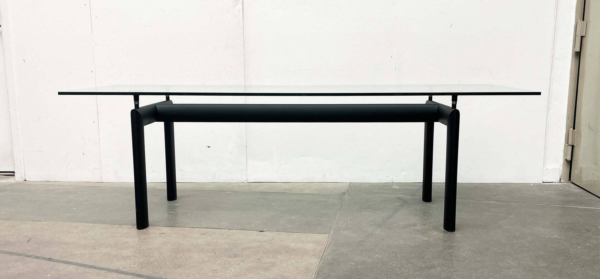 Italian model LC6 dining or office table in metal and glass by Le Corbusier, Pierre Jeanneret, Charlotte Perriand for Cassina.