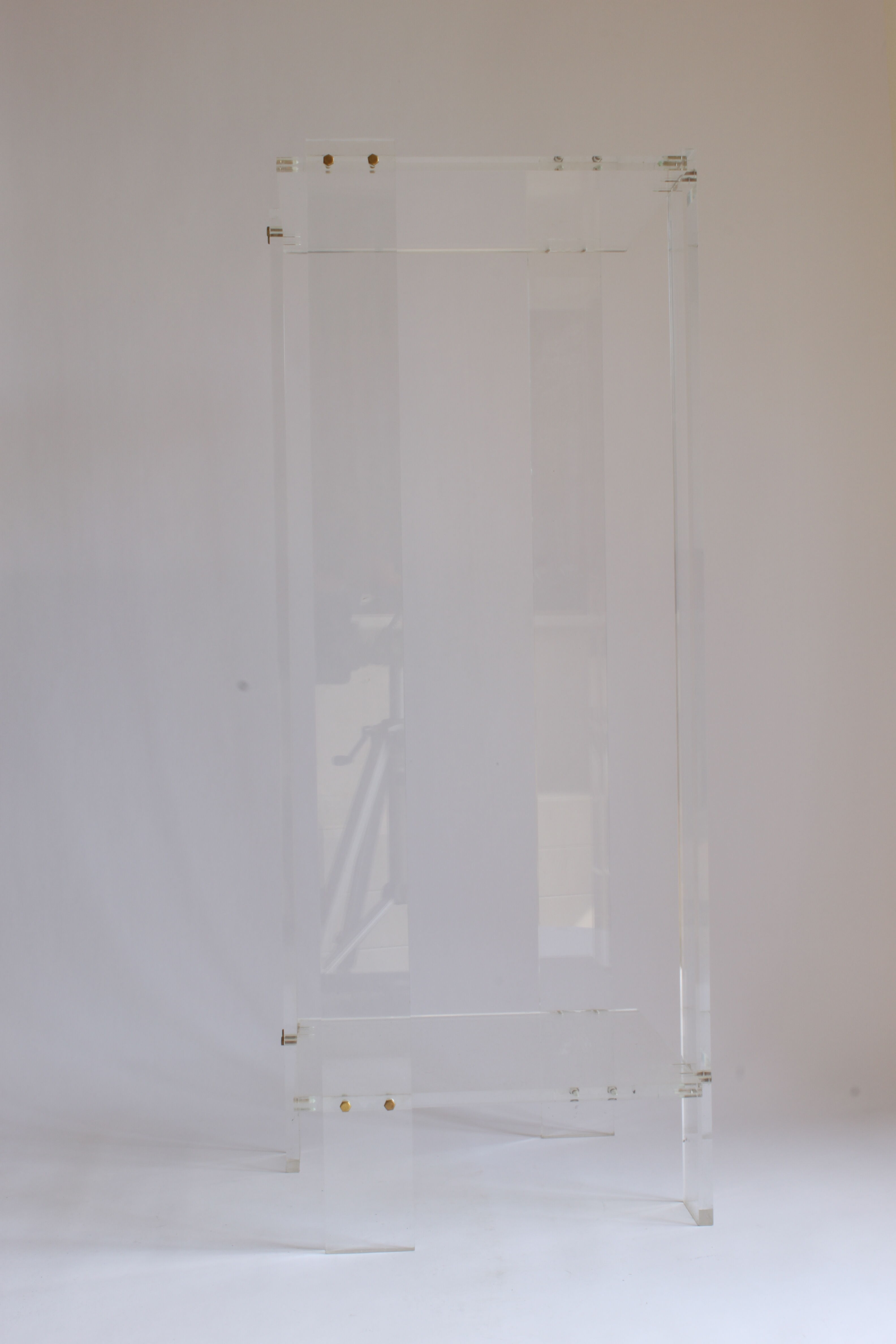 Tall lucite sidetable, 1970s.