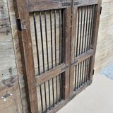 Old gate in Burmese teak and wrought iron