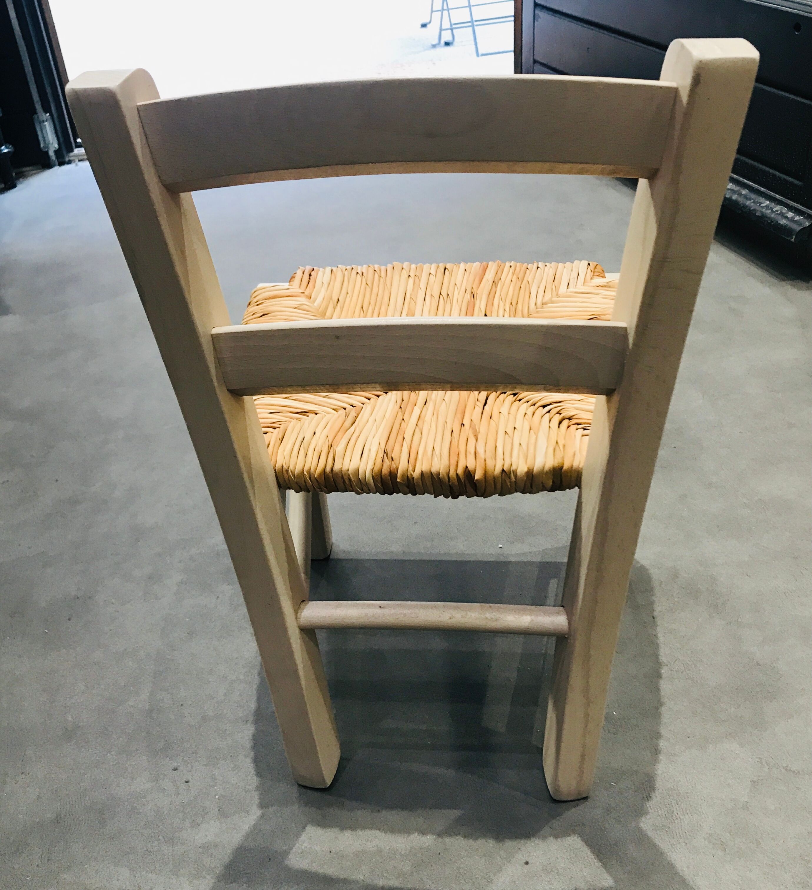 Straw seated wooden chair