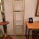 Golden brass shelf Hollywood Regency