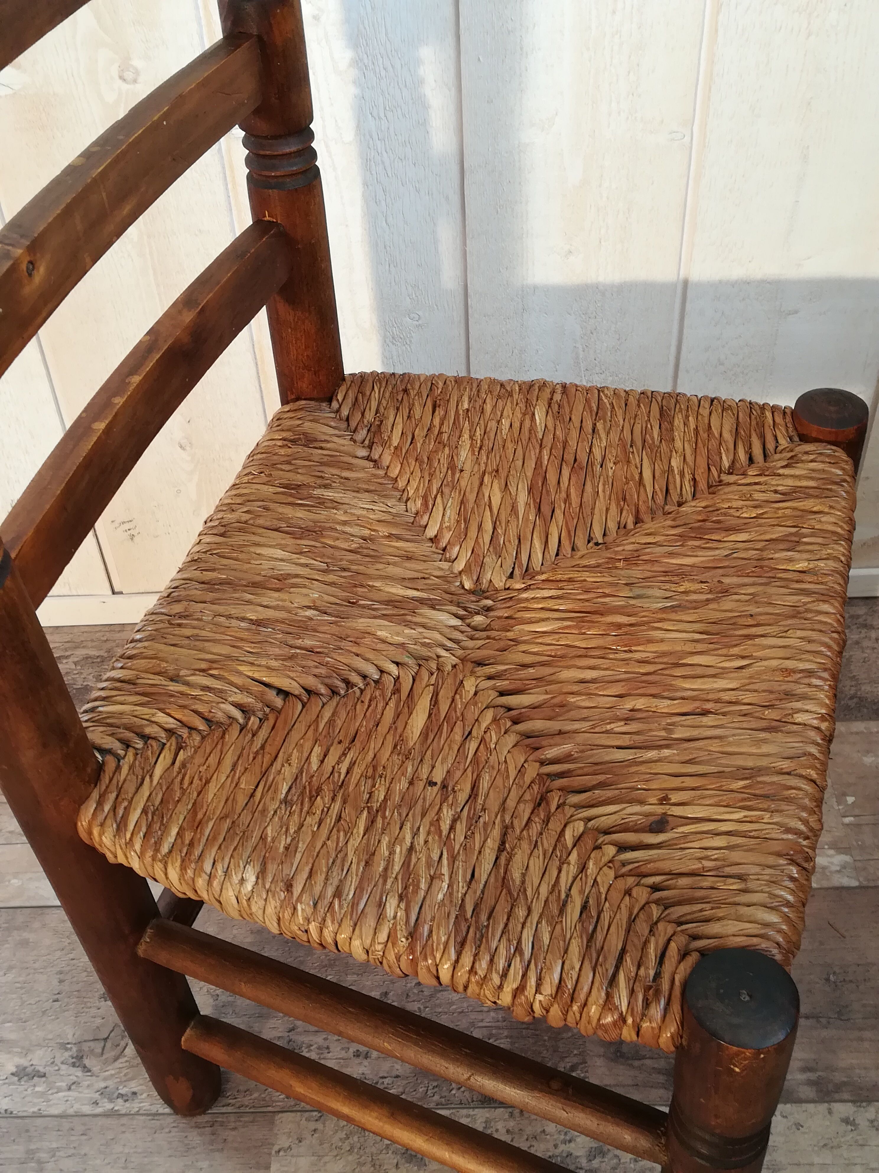 Wooden chair and straw