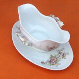 Sauce boat on dormant white porcelain, floral decoration