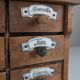 Cabinet à épices en bois rustique espagnol avec étiquettes en céramique, années 1930