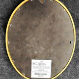 Oval mirror of 30 x 24 cm with its golden entourage of biedermeier