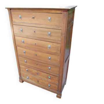 Empire period walnut chest of drawers from the 19th century.