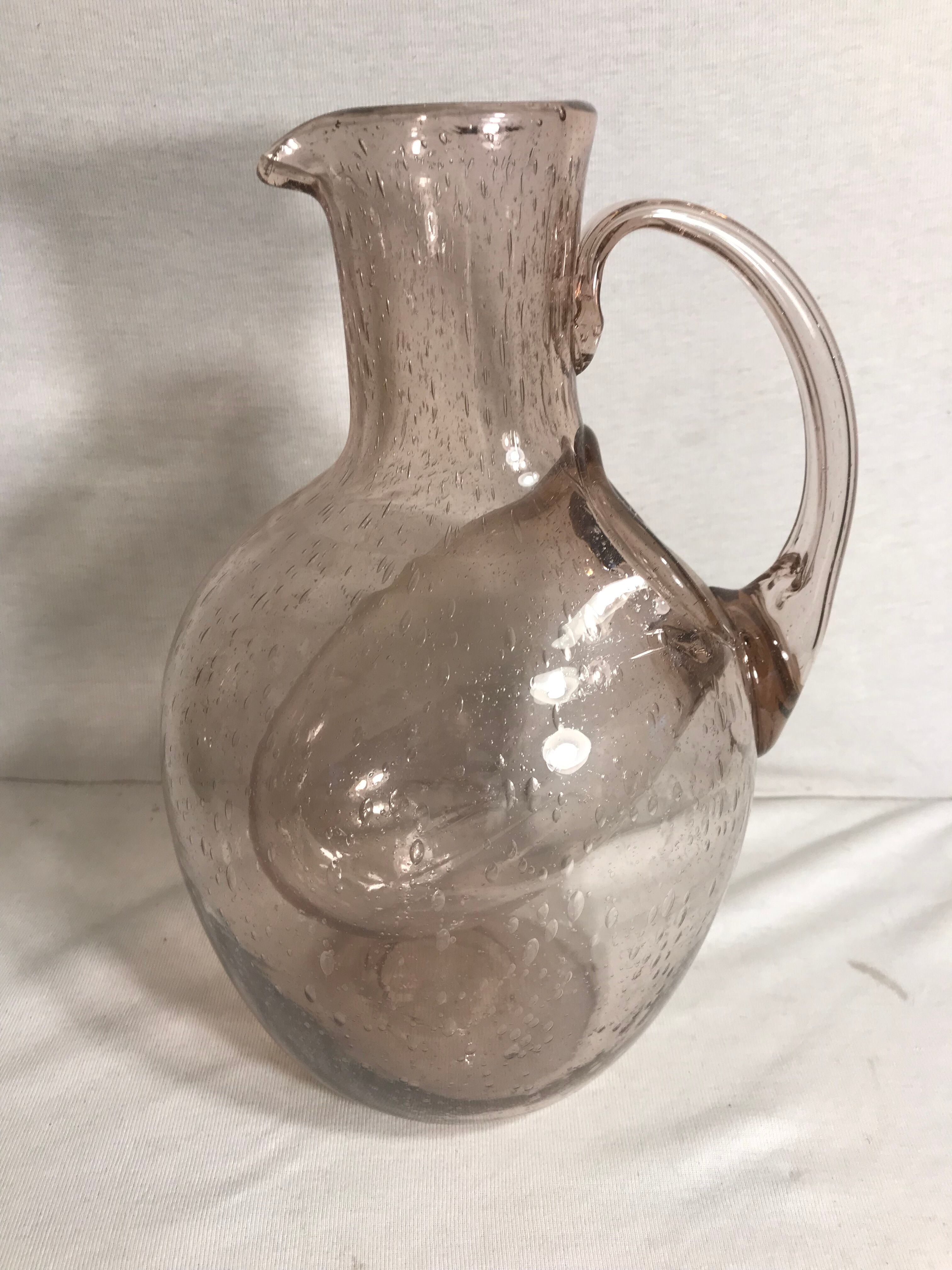 Bubble blown glass jug
