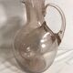 Bubble blown glass jug