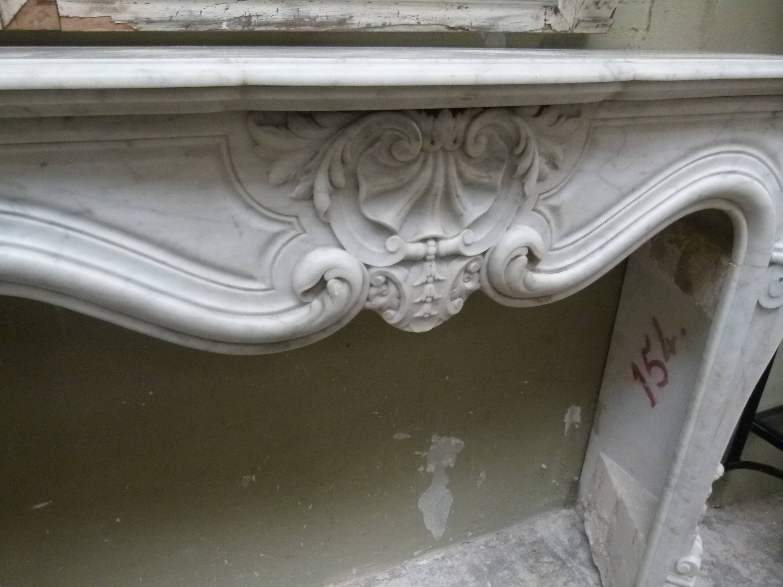 Louis XVI marble fireplace from the 19th century