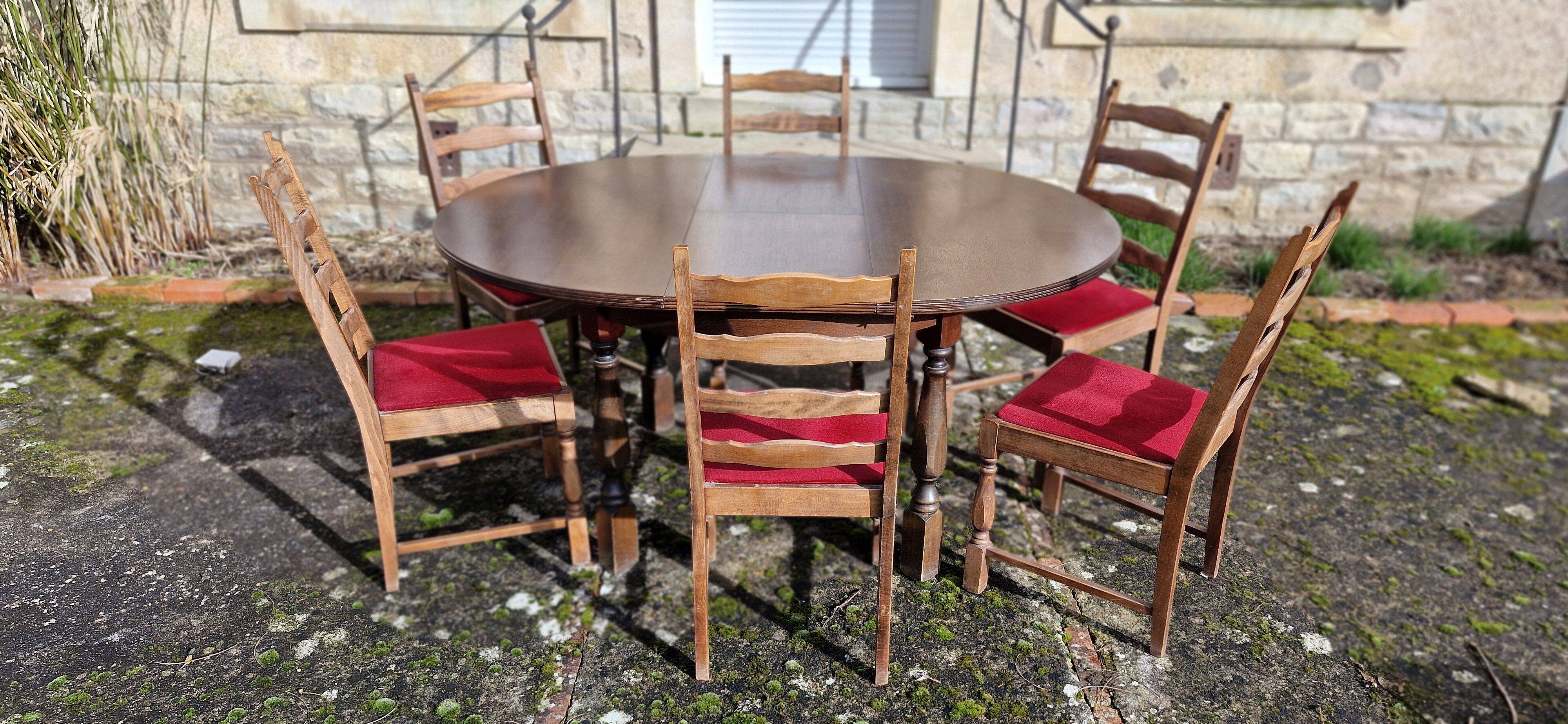 Round wooden table with 1 integrated extension + 6 wooden and fabric chairs