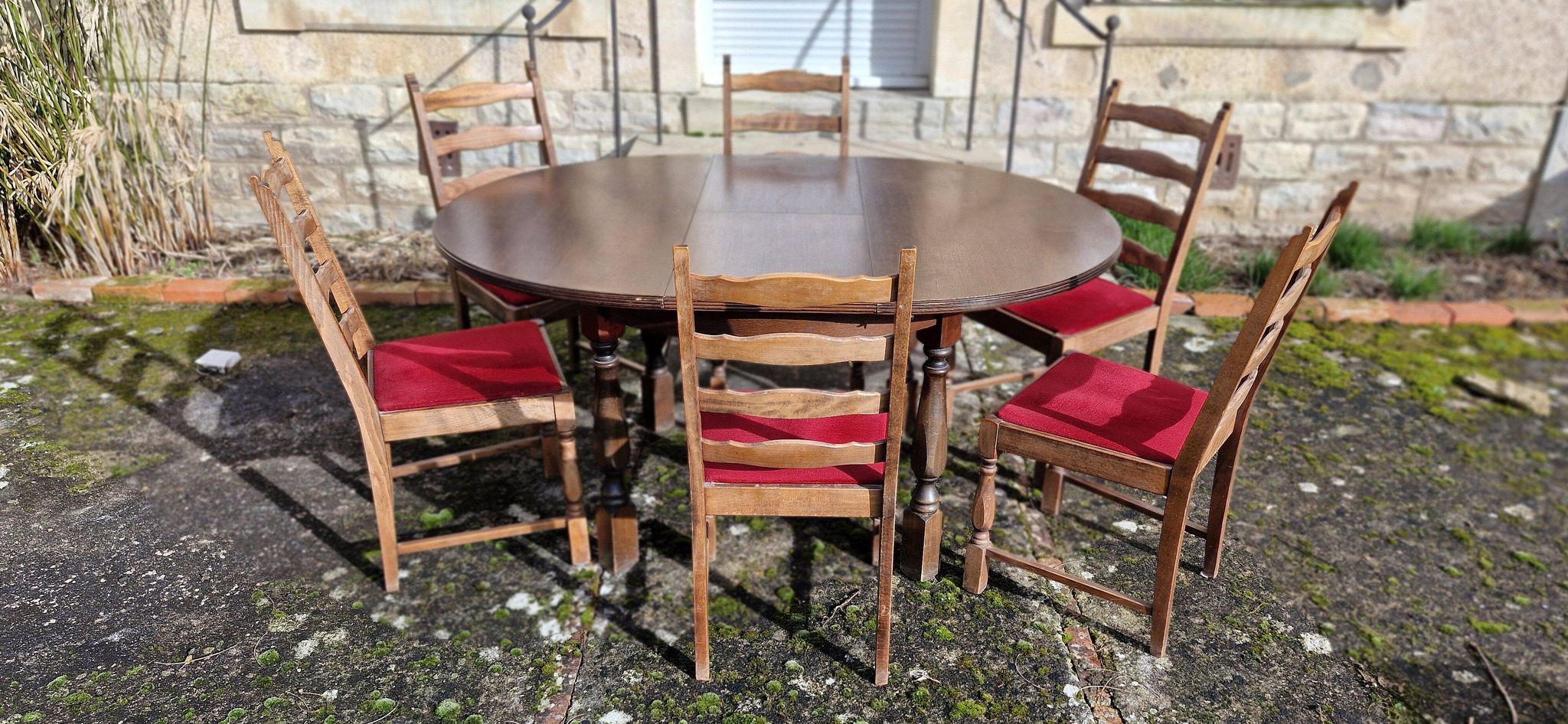 Round wooden table with 1 integrated extension + 6 wooden and fabric chairs