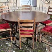 Round wooden table with 1 integrated extension + 6 wooden and fabric chairs