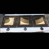 Triptych puzzle mirror in raw varnished metal