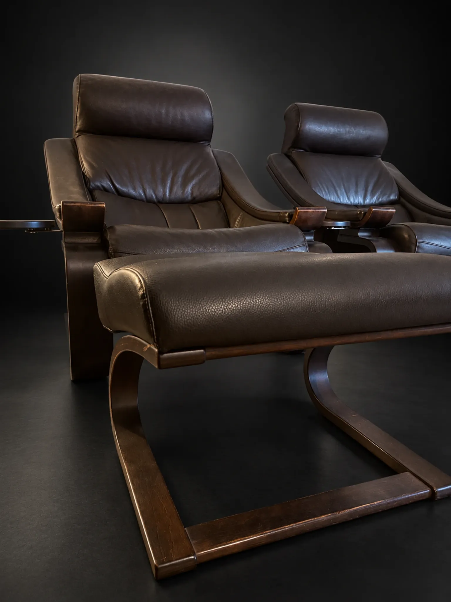 Pair of Kroken armchairs and ottoman — Åke Fribyter, marketed p