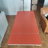 Table year 70 in orange Formica