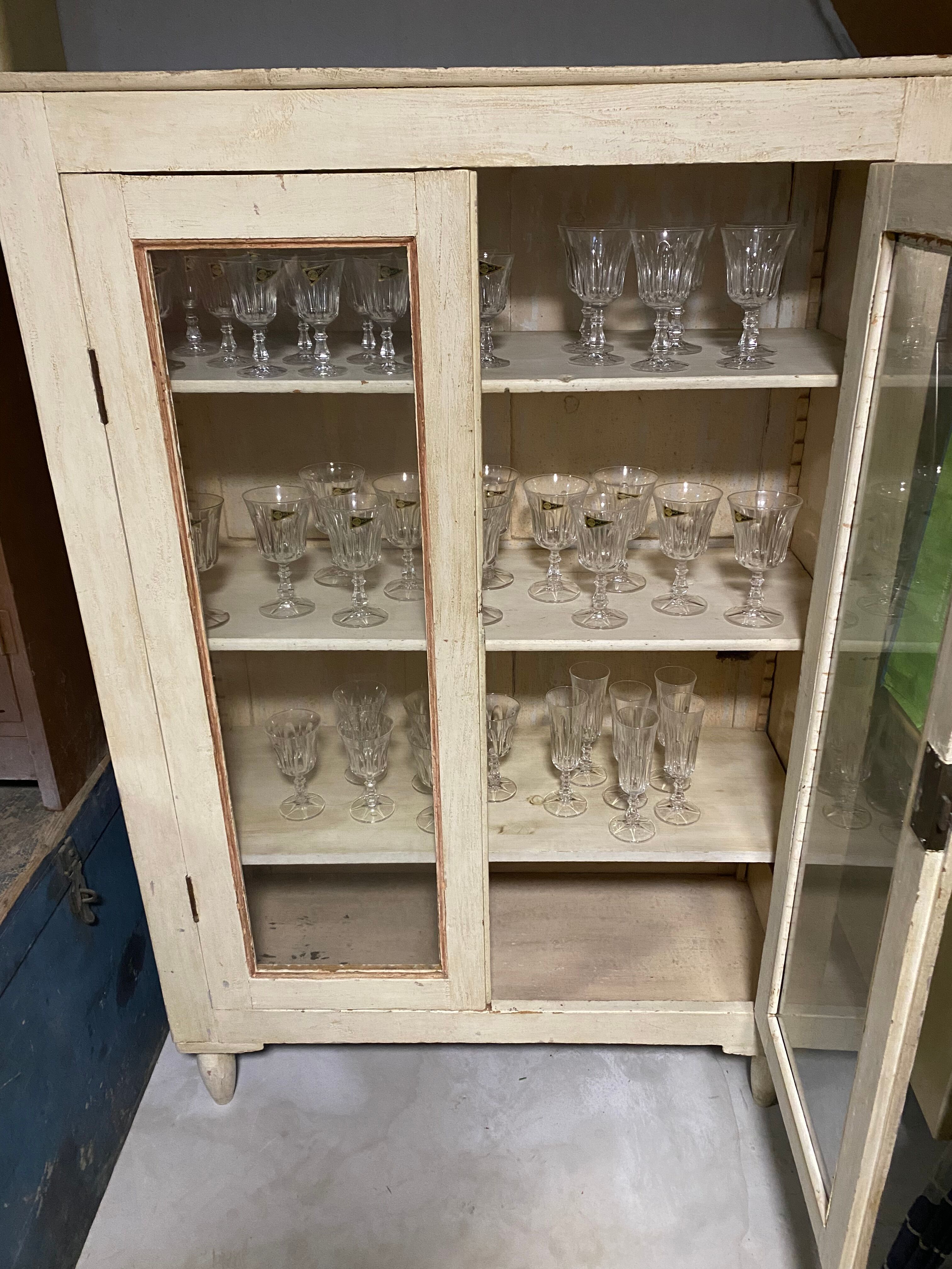 Cream patinated glass cabinet