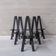 Set of six black dining chairs
