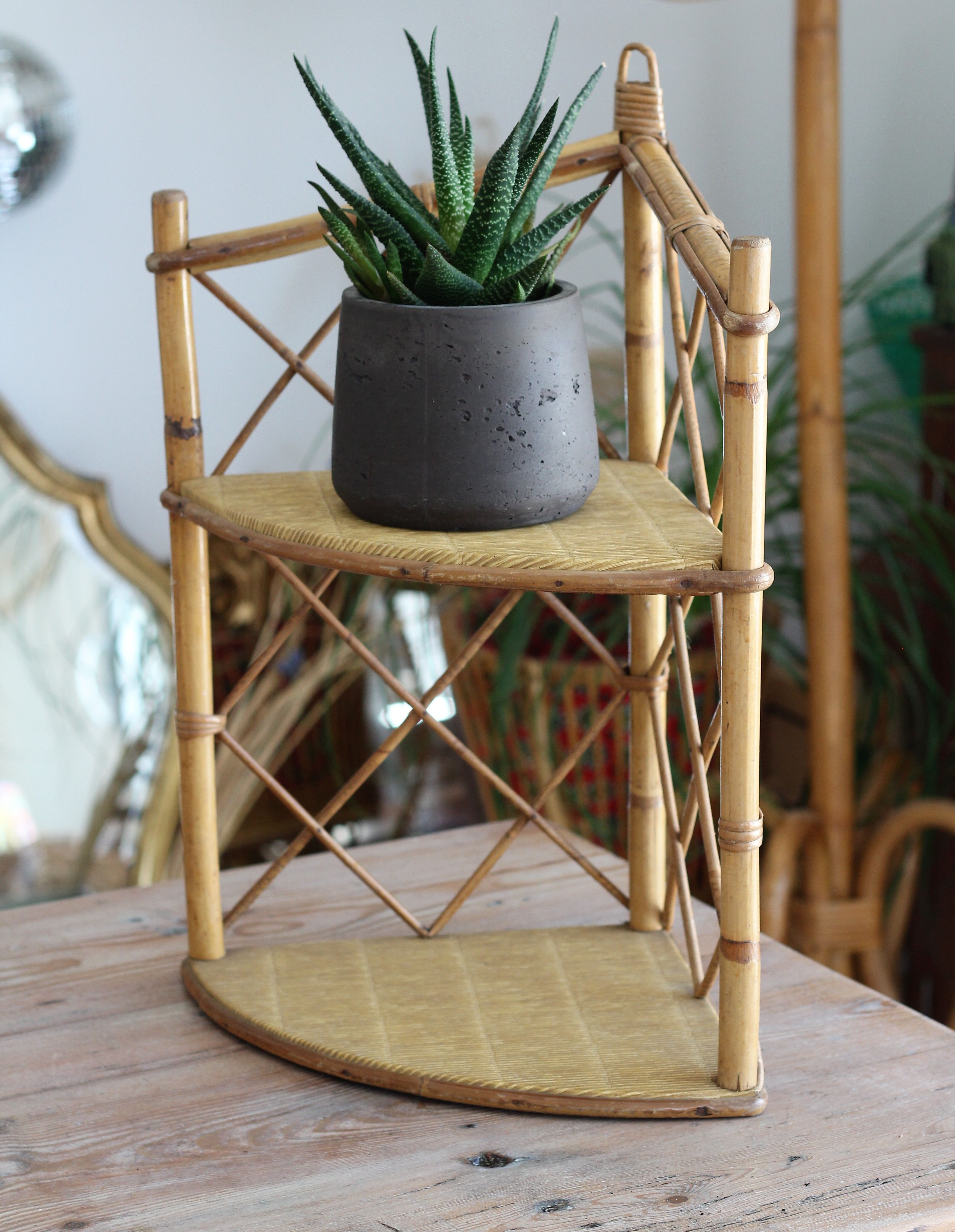Rattan corner shelf
