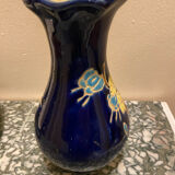 Small vase with floral patterns in the style of Longwy.