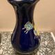 Small vase with floral patterns in the style of Longwy.