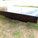 Table basse par Jean Claude Mahey laque et filet de laiton