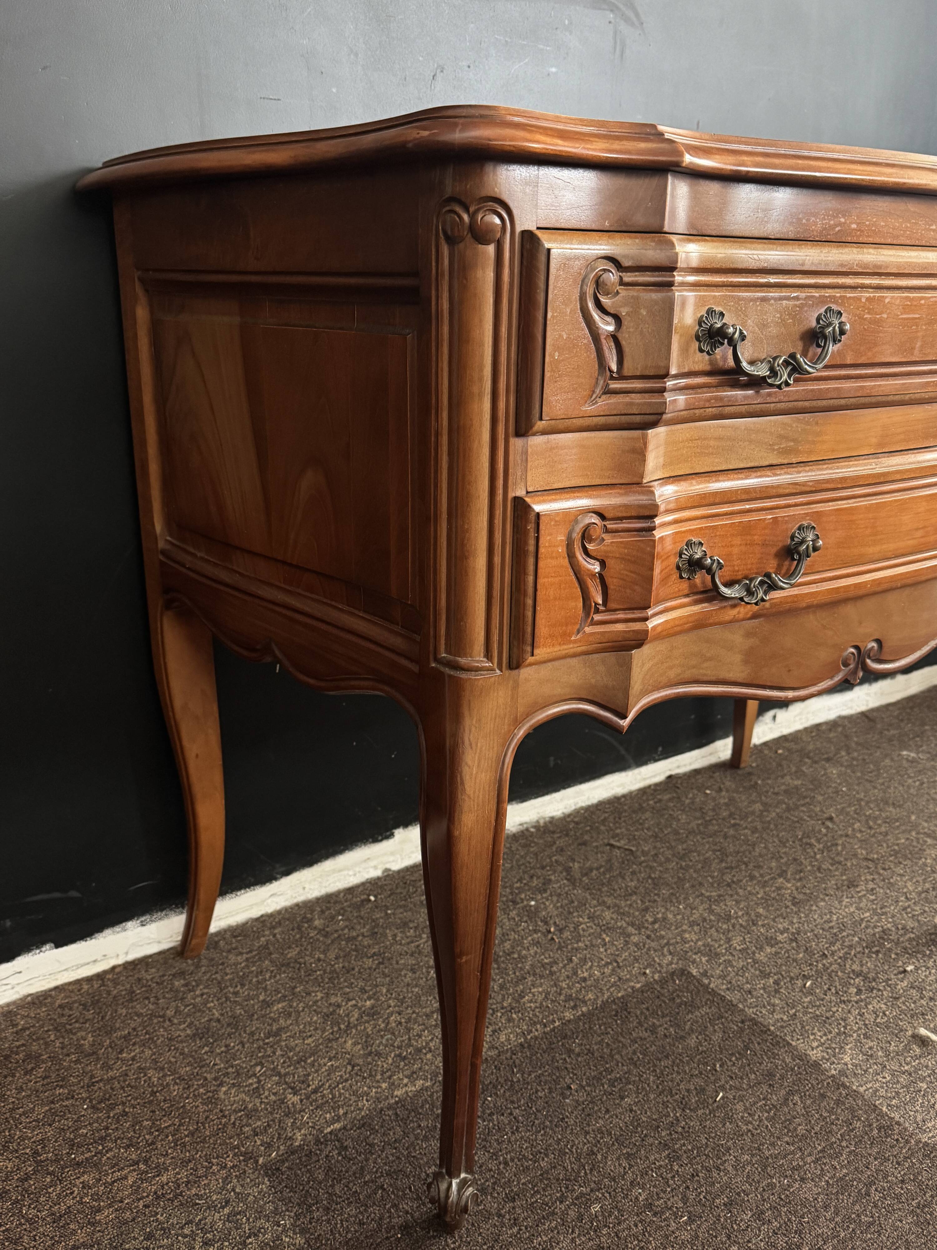 Carved wooden chest of drawers