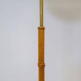 Mid-century floor lamp in brass and oak by Falkenbergs Belysning, Sweden, 1960s.