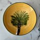 Plat rond palmier poterie Le Photophore