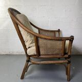 Colonial armchair in wood and canework